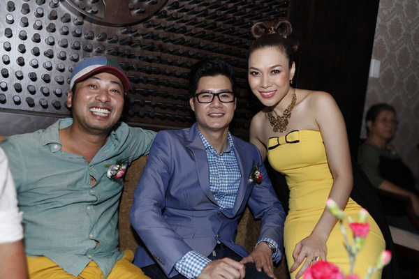 Đạo diễn Nguyễn Quang Dũng (trái) cũng là bạn thân của Mỹ Tâm.