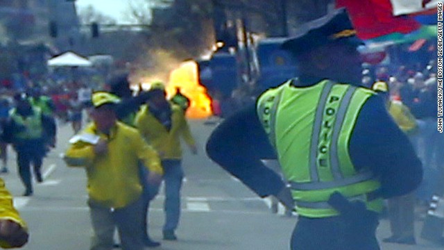 The second explosion goes off near the finish line.